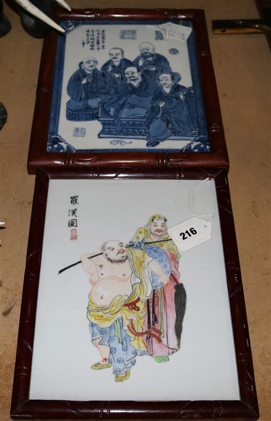 Chinese famille rose porcelain panel and a similar blue and white panel, both in faux bamboo frames